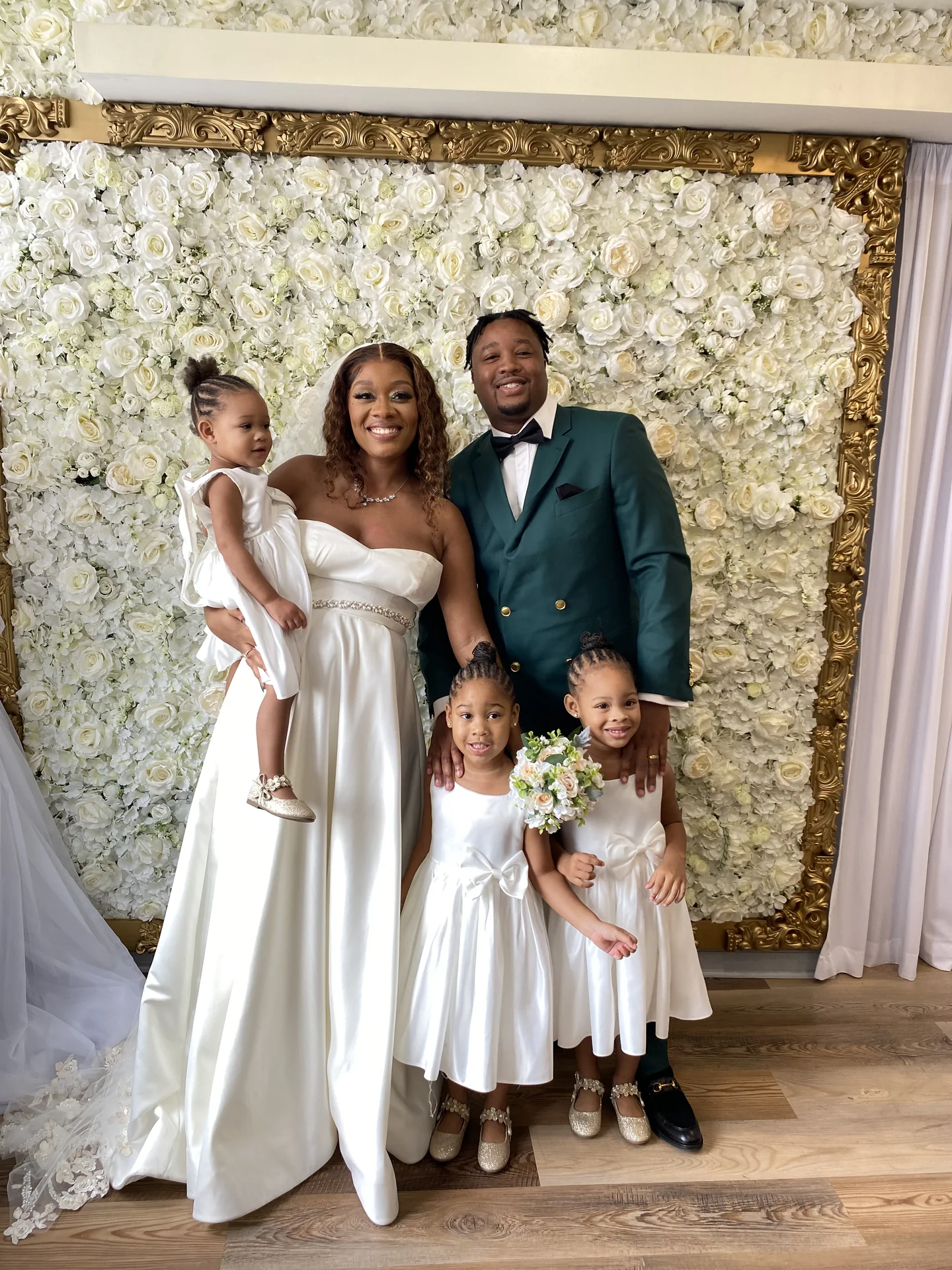 Bride and groom with their flower girls