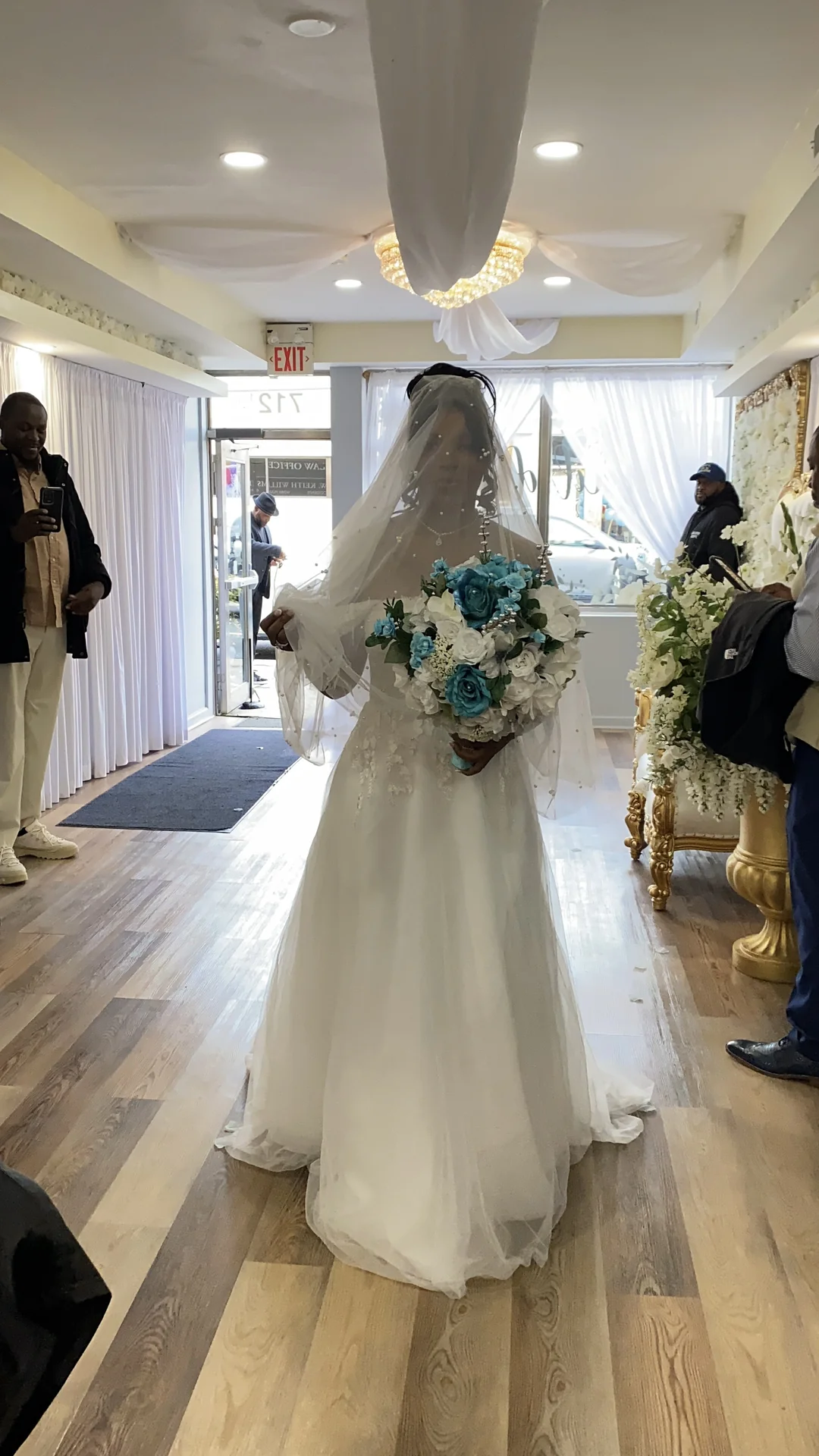 Bride walking down the aisle with her bouquet
